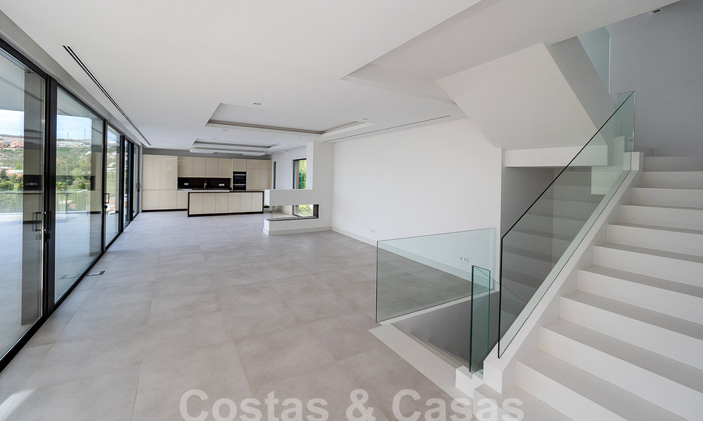Villa de luxe moderniste à vendre avec vue magnifique sur la mer et le terrain de golf à Benahavis - Marbella 54471