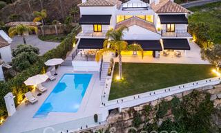 Prestigieuse villa espagnole de luxe à vendre avec une vue magnifique sur les collines de La Quinta, Benahavis - Marbella 64945 