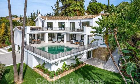 Spacieuse villa de luxe à vendre, de style architectural traditionnel, située dans un quartier résidentiel privilégié du Nouveau Mille d'Or, Marbella - Benahavis 55006