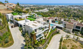 Superbe villa de luxe architecturale à vendre avec vue sur la mer dans un quartier résidentiel protégé sur les collines de La Quinta à Marbella - Benahavis 54126 