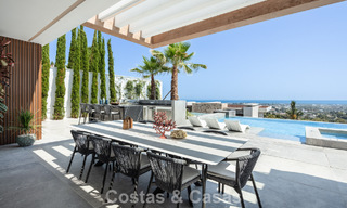 Superbe villa de luxe architecturale à vendre avec vue sur la mer dans un quartier résidentiel protégé sur les collines de La Quinta à Marbella - Benahavis 54146 