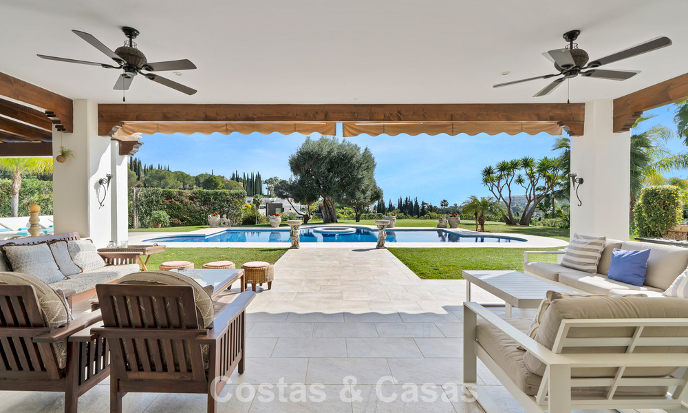 Maison luxueuse de style andalou avec vue sur la mer dans la vallée du golf de Nueva Andalucia, Marbella 779199