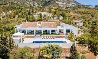 Spacieuse villa de luxe à vendre avec vue panoramique sur la mer sur un grand terrain à Mijas, Costa del Sol 55615 