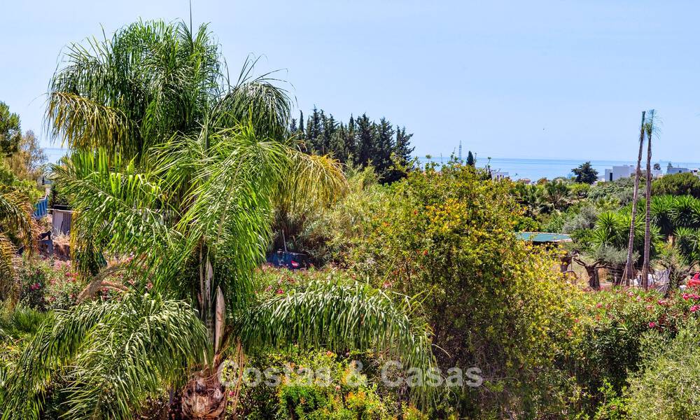 Villa de luxe de style andalou entourée de verdure sur un grand terrain à Marbella - Estepona 56332