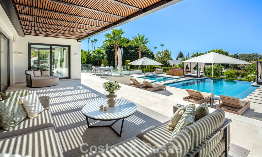 Villa de luxe, moderne et symétrique à vendre à deux pas des terrains de golf de la vallée de Nueva Andalucia, Marbella 56183