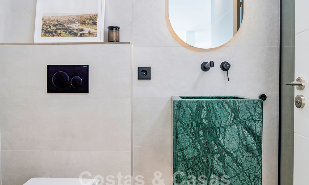 Jolie villa de luxe de style Ibiza à vendre à proximité de toutes les commodités à Nueva Andalucia, Marbella 56925