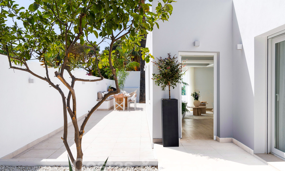 Jolie villa de luxe de style Ibiza à vendre à proximité de toutes les commodités à Nueva Andalucia, Marbella 56958