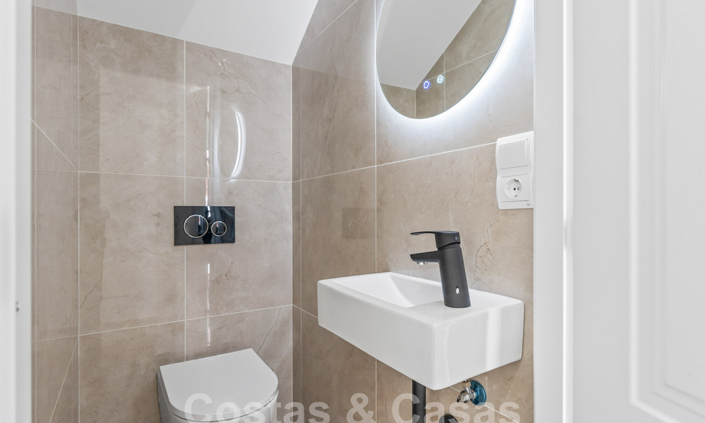 Penthouse contemporain rénové à vendre à distance de marche de toutes les commodités et de Puerto Banus à Nueva Andalucia, Marbella 57438