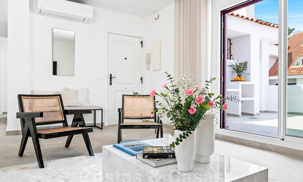 Penthouse contemporain rénové à vendre à distance de marche de toutes les commodités et de Puerto Banus à Nueva Andalucia, Marbella 57448