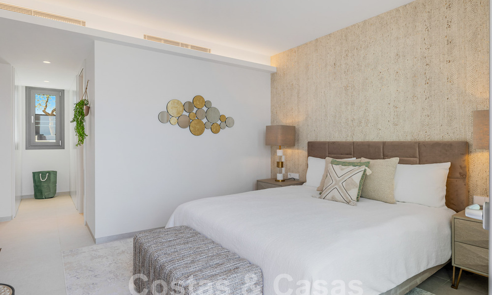 Superbe appartement neuf à vendre avec vue phénoménale sur la mer, le golf et les montagnes, Marbella - Benahavis 58356