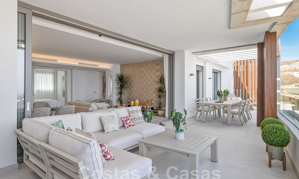 Superbe appartement neuf à vendre avec vue phénoménale sur la mer, le golf et les montagnes, Marbella - Benahavis 58364