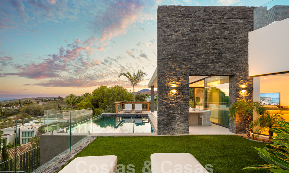 Prestigieuse villa de luxe moderne à vendre avec vue imprenable sur la mer dans une communauté fermée à Marbella - Benahavis 58692