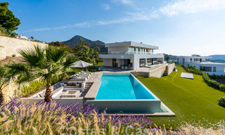 Villa de luxe moderne à vendre avec vue sur la mer dans une communauté fermée entourée de nature à Marbella - Benahavis 59228 