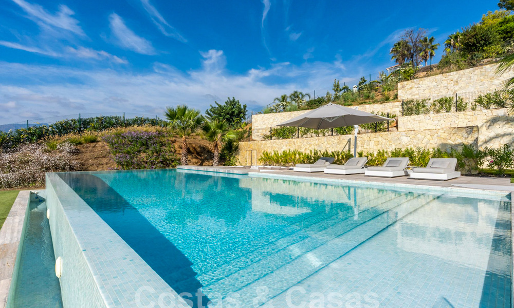 Villa de luxe moderne à vendre avec vue sur la mer dans une communauté fermée entourée de nature à Marbella - Benahavis 59231