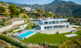 Villa de luxe moderne à vendre avec vue sur la mer dans une communauté fermée entourée de nature à Marbella - Benahavis 59240 