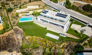 Villa de luxe moderne à vendre avec vue sur la mer dans une communauté fermée entourée de nature à Marbella - Benahavis 59243 