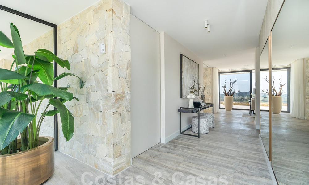 Villa de luxe moderne à vendre avec vue sur la mer dans une communauté fermée entourée de nature à Marbella - Benahavis 59245