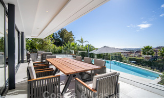 Villa de luxe sophistiquée à l'architecture ultramoderne à vendre dans la vallée du golf de Nueva Andalucia, Marbella 60607 
