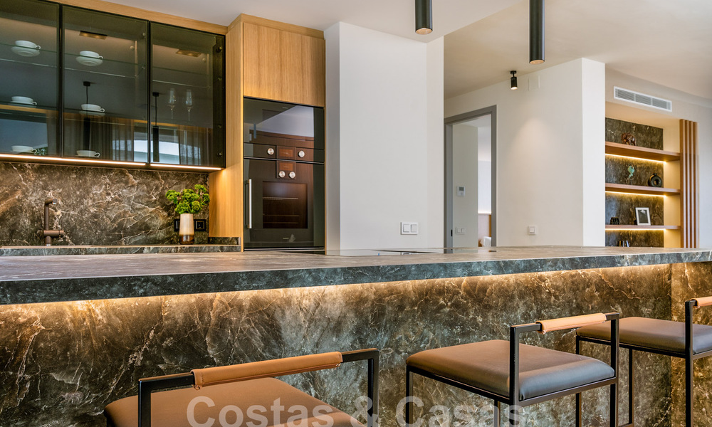 Maison de ville luxueusement rénovée à vendre dans un quartier résidentiel privilégié du Golden Mile de Marbella 61635