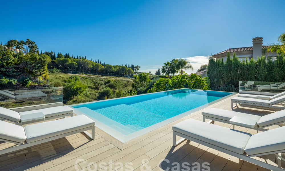 Villa de luxe sophistiquée au design moderne à vendre à distance de marche du terrain de golf à Nueva Andalucia, Marbella 61348