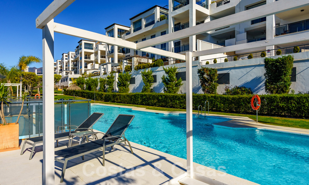 Spacieux appartement moderne à vendre avec vue panoramique sur le golf et la mer dans un complexe de golf cinq étoiles à Benahavis - Marbella 62341