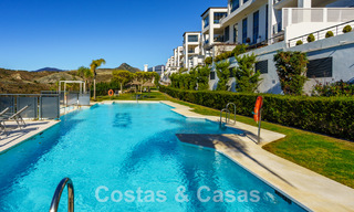 Spacieux appartement moderne à vendre avec vue panoramique sur le golf et la mer dans un complexe de golf cinq étoiles à Benahavis - Marbella 62342 