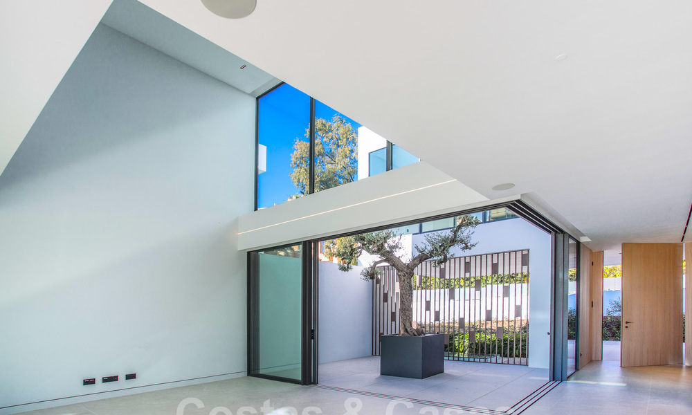 Villas de luxe prêtes à emménager, à vendre dans un nouveau complexe innovant composé de 12 villas sophistiquées avec vue sur la mer, sur le Golden Mile de Marbella 62666