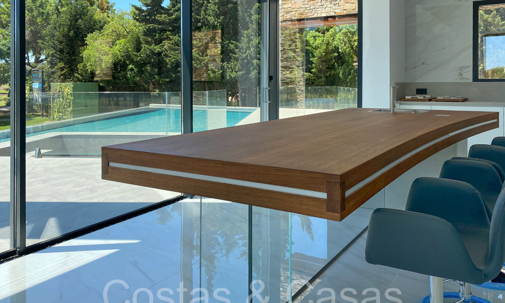 Villa design sophistiquée à vendre au bord d'un terrain de golf dans un complexe prestigieux à Sotogrande - San Roque, Costa del Sol 63996