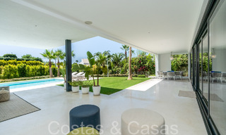 Villa de luxe supérieure à l'architecture moderne à vendre à deux pas de la vallée du golf de Nueva Andalucia, Marbella 64186 