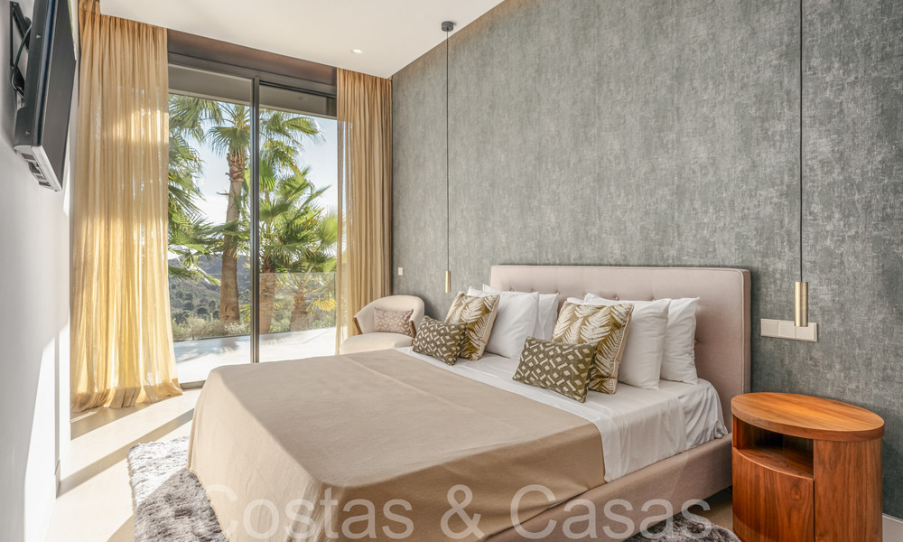 Prête à emménager, villa de luxe moderne à vendre, en première ligne de golf dans le prestigieux Marbella Club Golf Resort à Benahavis 65370