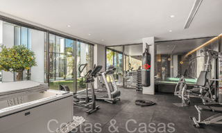 Prête à emménager, villa de luxe moderne à vendre, en première ligne de golf dans le prestigieux Marbella Club Golf Resort à Benahavis 65375 