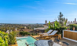 Luxueux appartement à vendre avec terrasse accueillante, piscine privée et vue sur la mer à Nueva Andalucia, Marbella 65182 
