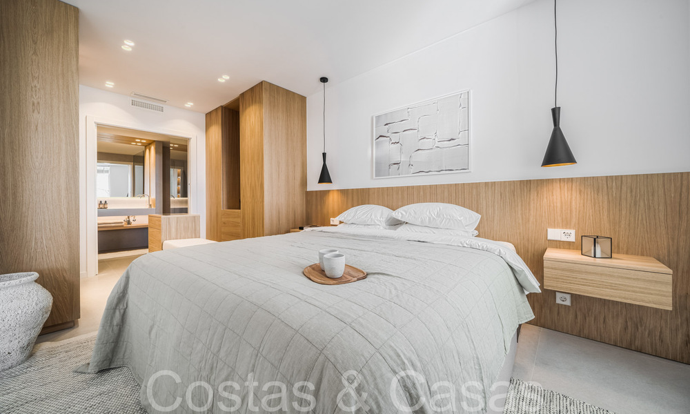 Luxueux appartement à vendre avec terrasse accueillante, piscine privée et vue sur la mer à Nueva Andalucia, Marbella 65188