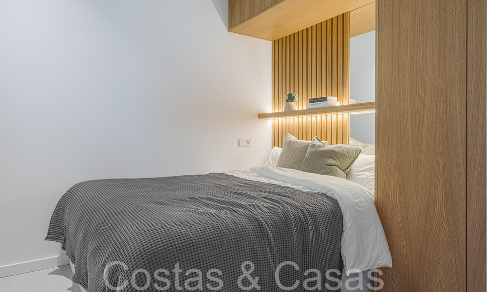 Luxueux appartement à vendre avec terrasse accueillante, piscine privée et vue sur la mer à Nueva Andalucia, Marbella 65195