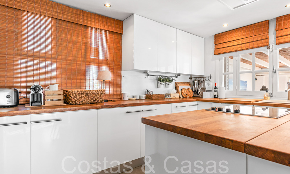 Maison de plage à vendre avec une vue imprenable sur la mer dans un complexe de première ligne de plage près de la ville d'Estepona 65406