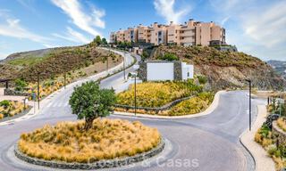 Prêt à emménager, appartement de luxe à vendre dans un prestigieux complexe de golf sur les collines de Marbella - Benahavis 66459 