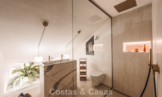 Maison de ville luxueusement rénovée avec vue sur la mer à vendre, dans un quartier fermé sur le Golden Mile de Marbella 775006 