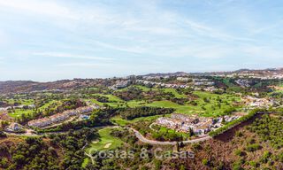 Maisons de ville neuves de 3 chambres à vendre dans un prestigieux complexe de golf à Mijas, Costa del Sol 775405 