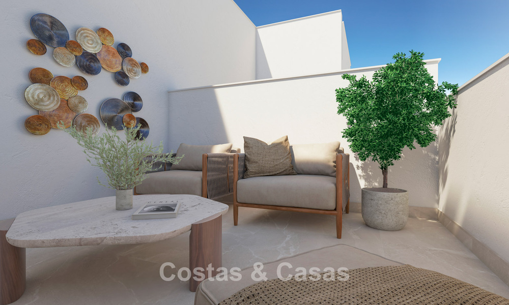Maisons de ville neuves de 3 chambres à vendre dans un prestigieux complexe de golf à Mijas, Costa del Sol 775413