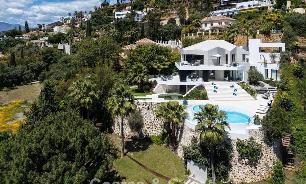 Villa design avant-gardiste avec vue panoramique sur la mer à vendre dans une résidence fermée à Benahavis - Marbella 780010