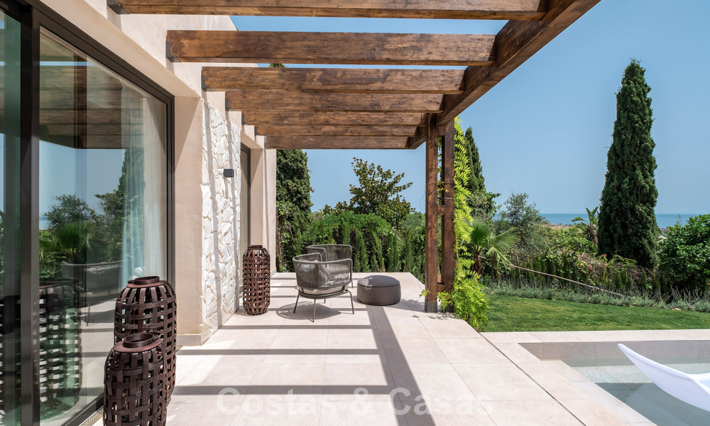 Villa de luxe de style Ibiza, prête à emménager, à vendre dans une urbanisation très recherchée de Benahavis - Marbella 780032