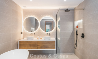Appartement de luxe de 4 chambres à vendre dans un complexe fermé sur le terrain de golf de Nueva Andalucia, Marbella 780352 