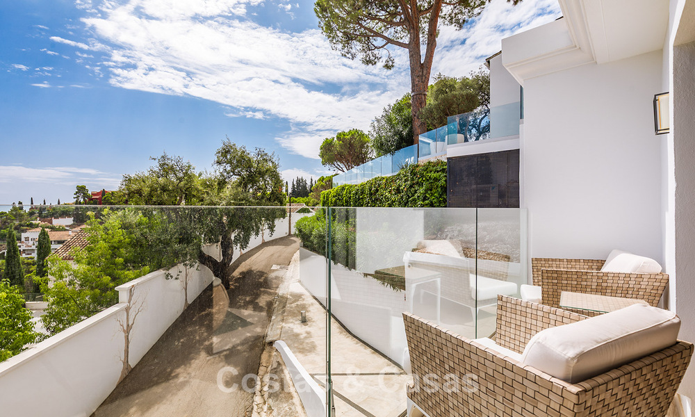 Spacieuse villa avec vue sur la mer et logement d'invités indépendant à vendre à El Madroñal en Benahavis - Marbella 786454
