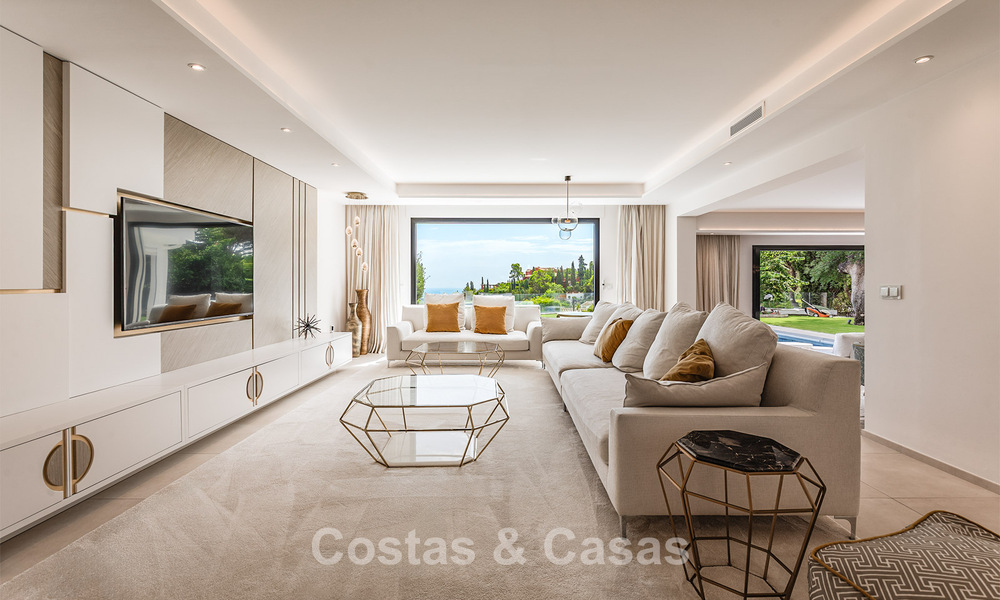 Spacieuse villa avec vue sur la mer et logement d'invités indépendant à vendre à El Madroñal en Benahavis - Marbella 786456