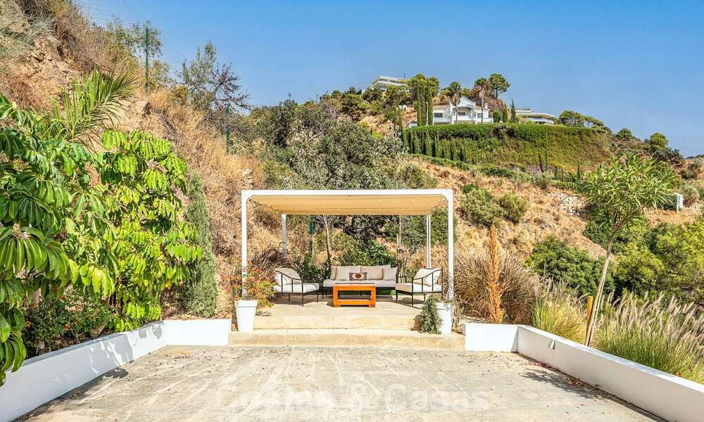 Villa de luxe méditerranéenne avec vue panoramique à vendre, nichée dans les collines verdoyantes de Marbella - Benahavís 789936