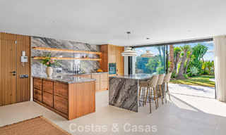 Villa familiale rénovée de haute qualité à vendre dans le prestigieux quartier de golf de Nueva Andalucía, Marbella 793182 