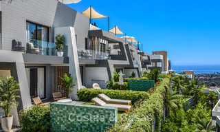 Lancement! Villas mitoyennes modernes avec vue mer à vendre dans un complexe de style resort à Elviria, Est de Marbella 793133 