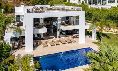 Villa de luxe exclusive au design moderniste à vendre dans la Vallée du Golf de Nueva Andalucía, Marbella 793961