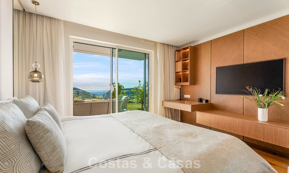 Appartement moderne avec jardin à vendre, offrant une vue sur la côte, dans un complexe fermé près de la ville de Marbella 794487