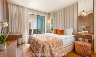 Appartement moderne avec jardin à vendre, offrant une vue sur la côte, dans un complexe fermé près de la ville de Marbella 794496 